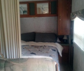 Camper Next To Rockingham Highschool One bedroom and a fold out couch