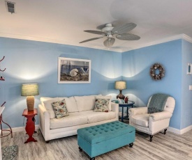 Breezy Beach Getaway Condo with Deck and Grill!